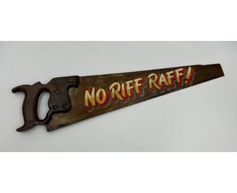 A vintage saw hand painted with ‘ No Riff Raff!’ Length 64cm. 