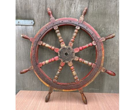A heavy vintage ship’s wheel. 100cm d. 