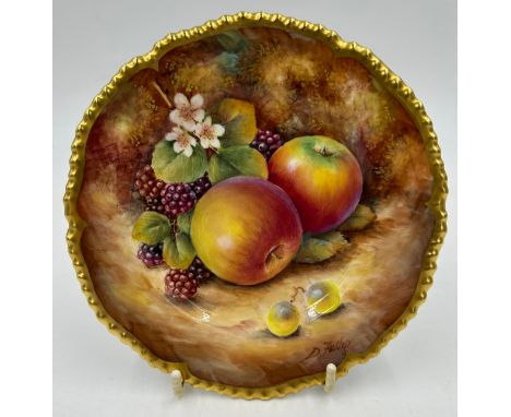 A Royal Worcester side plate decorated with apples and blackberries on a moss background with shaped gilt edge 15cm d signed 