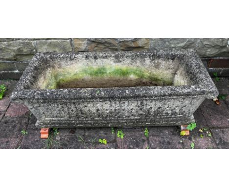 A reconstituted stone garden trough. Approximately 45cm d x 92cm w. 