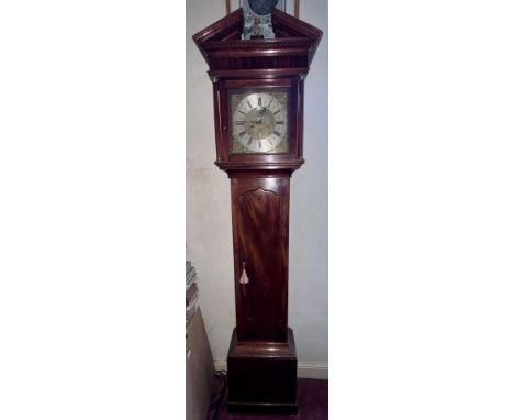 An 18thC 8 day mahogany longcase clock with broken pediment top and brass face by R Henderson, Scarborough. 