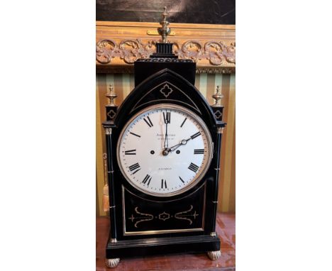 An early 19thC ebonised mantle clock with double fusée movement by John Pettit, 15 Bedford Square London. 