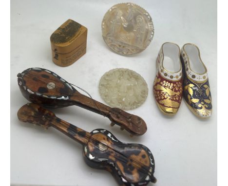 A miscellany to include Spode shoes, tortoiseshell guitar and mandolin, mother of pearl Bethlehem plaque mauchlin ware thimbl