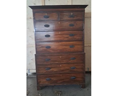 A 19thC mahogany chest on chest on bracket feet with brass handles. 174cm h x 107cm w x 51cm d. 