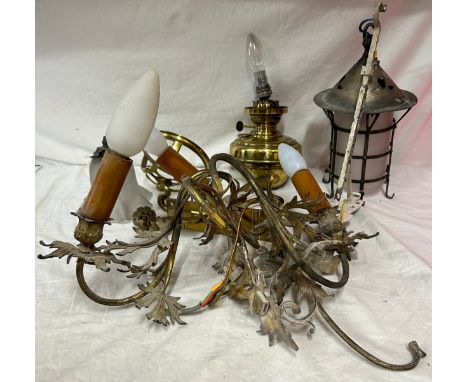 A collection of vintage lighting parts to include an electrified oil lamp together with a brass door knocker plate. 