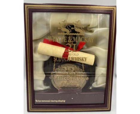 A 75cl bottle of Whyte &amp; Mackay 21 year old scotch whisky in original presentation case with scroll. 