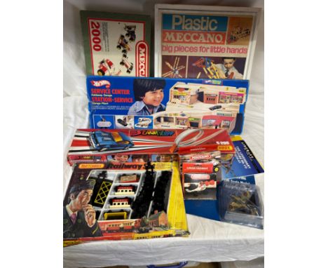 A quantity of various toys to include: Matchbox Railway Set G-2, Matchbox Streak Loop, Hot Wheels  Mattel Service Center Play