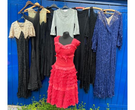 Vintage dresses to include 5 black silk and lace, 2 knitted dresses, blue lace dress and a 1950’s pink lace dress. 