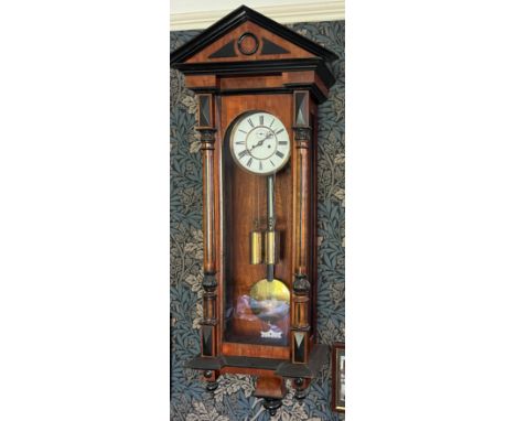 A 19thC double weight Vienna wall clock. 128cm x 41cm. 