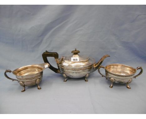 A Celtic design hallmarked silver three piece tea service Birmingham 1935