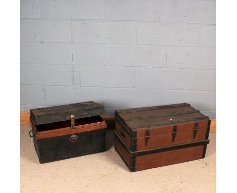 Japanned steel travelling trunk, with label to the interior, 60cm wide, together with a crocodile skin effect trunk, 74.5cm w
