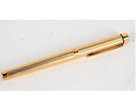 Sheaffer gold plated fountain pen, with 14 carat gold nib and engine turned case