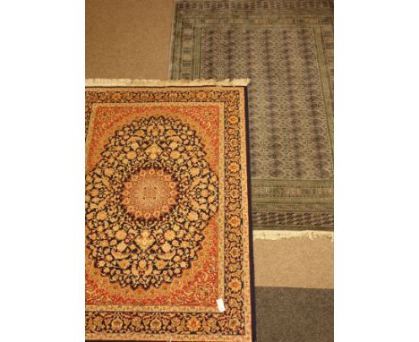Persian Bokhara design light blue ground rug (225cm x 150cm), and a Persian Kashan design blue ground rug/wall hanging (191cm