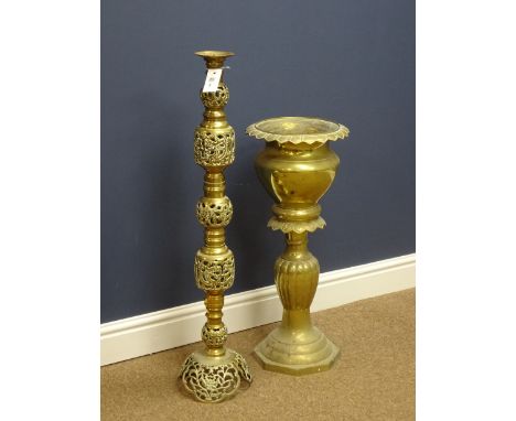 Eastern pierced brass floor standing candlestick and a vintage brass jardiniere, H68cm    Condition Report   Click here for f