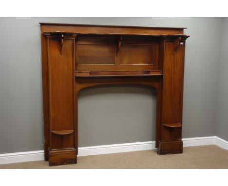 Large mahogany fire surround, reverse break front with arched aperture, raised shelves, W194cm, H170cm, D35cm, aperture - 106