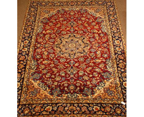 Persian Najafabad plumb ground rug carpet, with stylised scrolling floral field, 318cm x 250cm   Condition Report   Click her