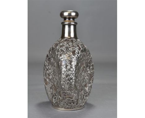 A Chinese glass bottle mounted with silver. 22.5cm tall