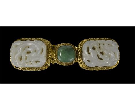 A Chinese 19th century belt buckle with white jade inserts carved into dragons with one extra jade stone. 10 length