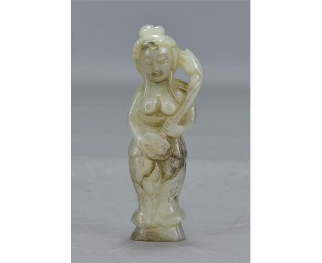 A carved celadon jade Guanyin. 8cm tall 