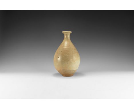 Yuan Dynasty, 1271-1368 AD. A glazed ceramic piriform vase with basal ring and inturned rim.  1.1 kg, 27.5cm (10 3/4"). Prope