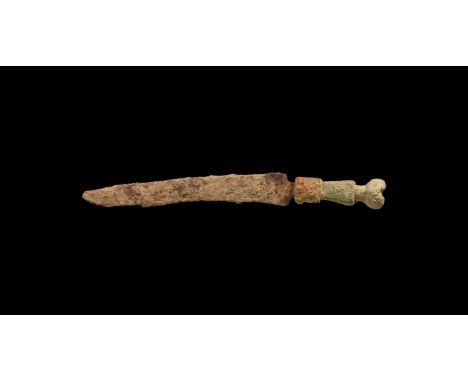 1st-2nd century AD. A hand knife comprising of a bronze handle with bulb finial and curved slender iron blade.  40 grams, 14.