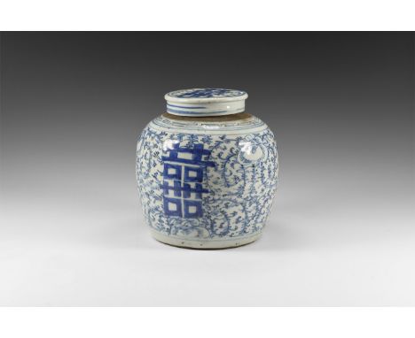 Qing Dynasty, 1616-1911 AD. A tin-glazed ceramic barrel-shaped ginger jar with dense pattern of fronds, hatched characters, r