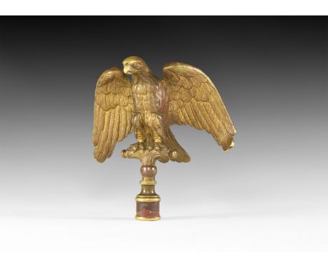 19th century AD. A cast North American eagle standard finial modelled in the round gripping a T-shaped bar with palmette deta