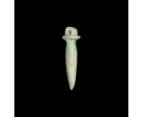Saite Period, 624-525 BC. A large pale green glazed composition wadj amulet with ribbed suspension loop. Cf. Andrews, C. Amul