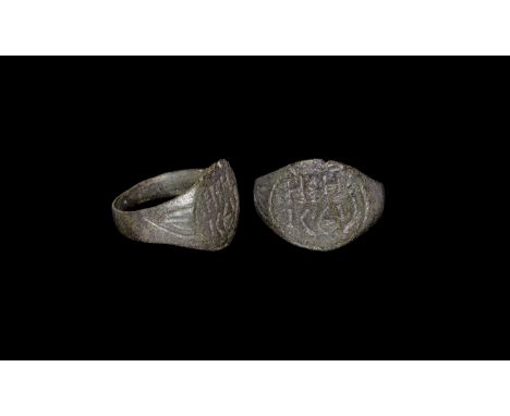 4th-6th century AD. A bronze finger ring with discoid bezel, incised border enclosing two lines of text 'H[.]H / ICEU'. See C