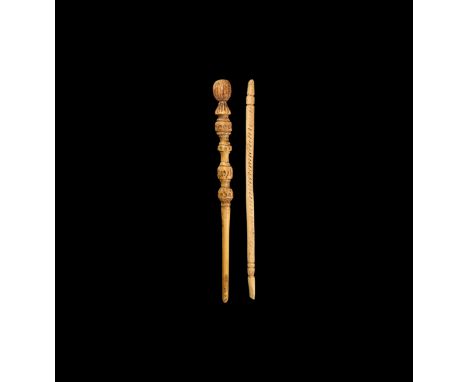 6th-9th century AD. A mixed bone group comprising: a pin with two pierced bulbs and cruciform finial; a pin formed as a bird 