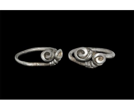 2nd century BC-1st century AD. A finger ring made from twisted silver wire with bezel formed from two opposed coils.  4.03 gr