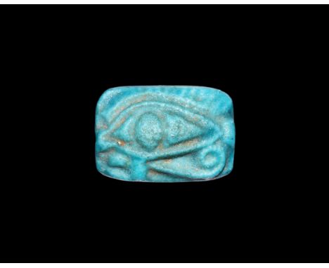 Third Intermediate Period, 1069-702 BC. A glazed composition domed rectangular plaque with high-relief wedjat motif. See Andr