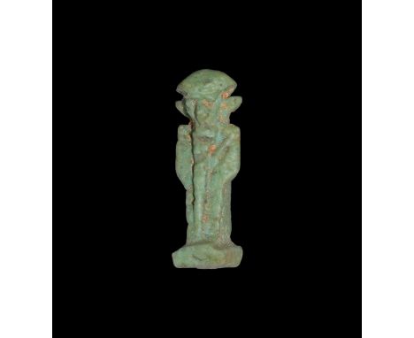 Late Dynastic Period, 664-332 BC. A green glazed composition amulet of Ptah on a rectangular base with dorsal pillar, grippin