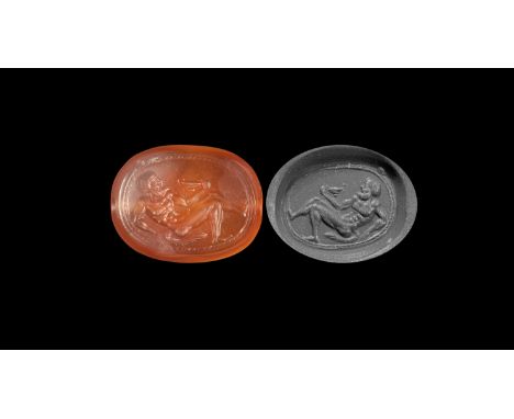 5th-3rd century BC. A carnelian bead with one flat and one domed face, intaglio reclining satyr, nude, resting on a ropework 