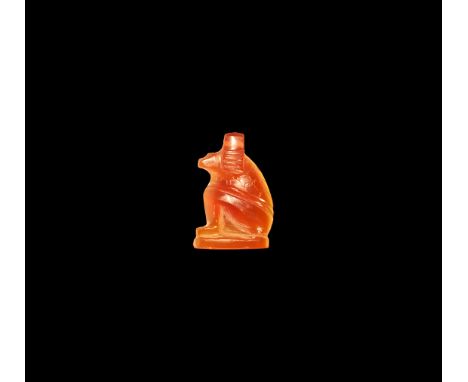 Ptolemaic Period, 332-30 BC. A carnelian amuletic profile figure of Babi in baboon form, crouching on a base. Cf. Flinders Pe