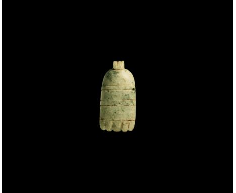 Saite Period, 664-525 BC. A carved agate lotus flower, plano-convex in section with ribbed and pierced lug, transverse bands,