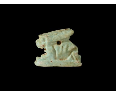 Late Dynastic Period, 664-332 BC. A pale green glazed composition amuletic figure of a hare on a rectangular base with rib de