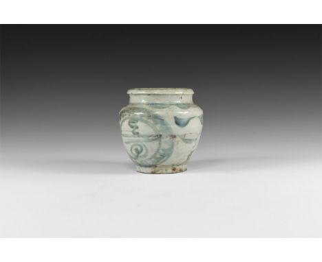 Song Dynasty, 960-1127 AD. A glazed ceramic jar with blue roundels and tendril decoration.  440 grams, 11cm (4 1/4"). Private