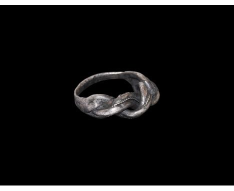 9th-11th century AD. A silver ring with double-loop of fine round-section wire with granule decoration to the edge. Cf. Sedov