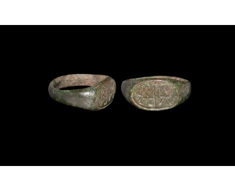 4th-6th century AD. A bronze finger ring with D-section hoop, elliptical bezel with incised border and two monograms. See Cha