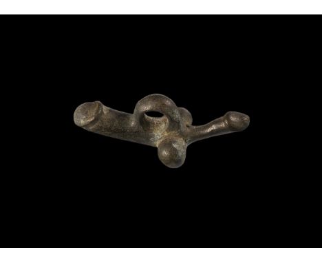 1st-2nd century AD. A bronze pendant in the form of a phallus with smaller phallus to the back; suspension loop to the top.  