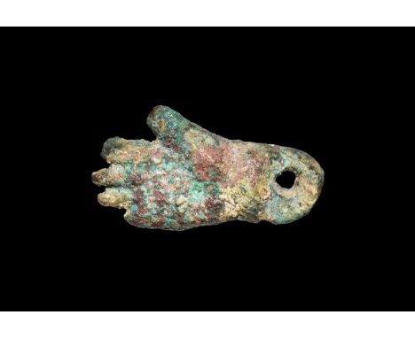 First Intermediate Period, 2181-2055 BC. A copper amulet of the right hand with splayed fingers and cupped palm, pierced susp