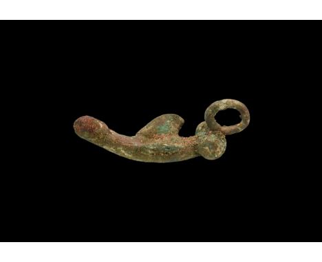 1st century AD. A silver pendant in the form of a phallus with wings to the side; suspension ring to the top.  15 grams, 45mm