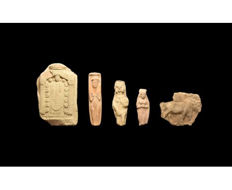 19th-8th century BC. A group of five ceramic plaques comprising of: a large figure of a goddess in a rectangular structure, r
