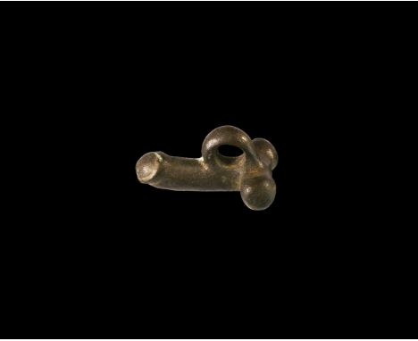 1st-2nd century AD. A bronze pendant in the shape of a phallus with suspension ring to the top.  24 grams, 35mm (1 1/2"). Pro