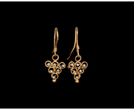 3rd century BC. A matched pair of gold wire earrings imitating bunches of grapes, each a loop with hooked finial, pendant of 