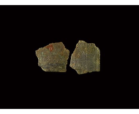 1st-3rd century AD. A fragment of bronze diploma with latin text to both sides, one reading '...IOST / AB IVM,' to the other 