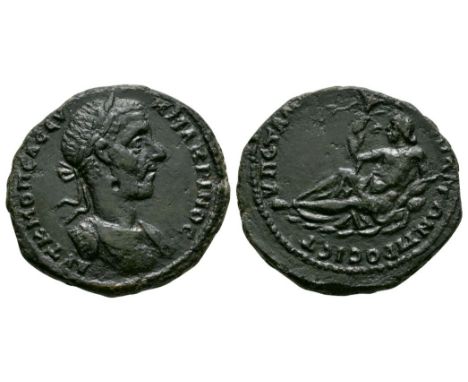 217-218 AD. Magistrate Sta. Longinos. Obv: AYT K M OPEL CEVH MAKRINOC legend with laureate and cuirassed bust right. Rev: VP 