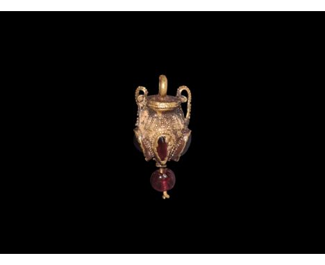 5th-3rd century BC. A gold miniature amphora pendant with two loop handles, granule detailing, garnet appliqués and finial.  
