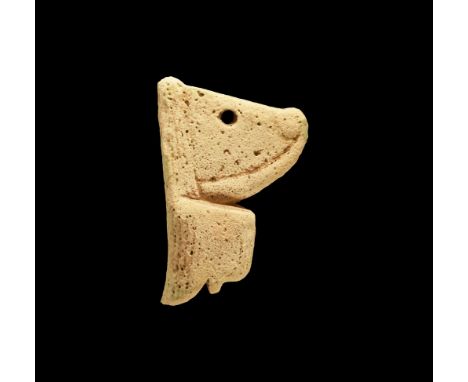 Late Period, 664-332 BC. A white glazed composition amulet of deshret the Red Crown of Upper Egypt. See Flinders Petrie, W.M.